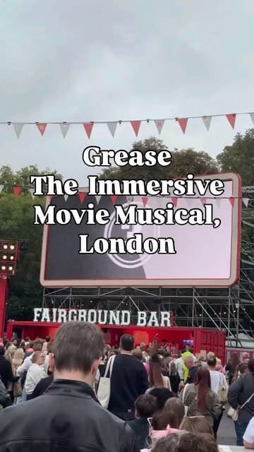 A vlog-style montage capturing the immersive Grease Secret Cinema experience, featuring actors, fairground rides, and the overall atmosphere of the event.