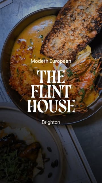 The creator visits The Flint House in Brighton to demonstrate the First Table app, which offers 50% off food bills. The video features a tour of the restaurant, close-ups of various dishes including oysters, steak, and desserts, and a clear explanation of the discount service.