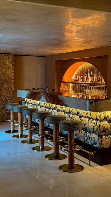 A high-quality, aesthetic montage showcasing the interior, cocktails, and Basque-inspired tapas dishes at Mirari in Cheltenham.