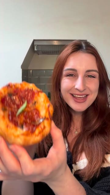 A home cooking tutorial demonstrating how to make gluten-free stuffed crust pizza pastries using Jus-Rol pastry, featuring the creator's process and a blooper reel.