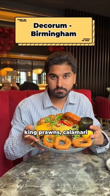 A fast-paced, engaging review of Decorum in Birmingham, highlighting the restaurant's upscale interior, creative cocktails, and a variety of dishes including steak, lamb cutlets, and a seafood platter. The video emphasizes the venue's status as a top-rated halal dining destination.