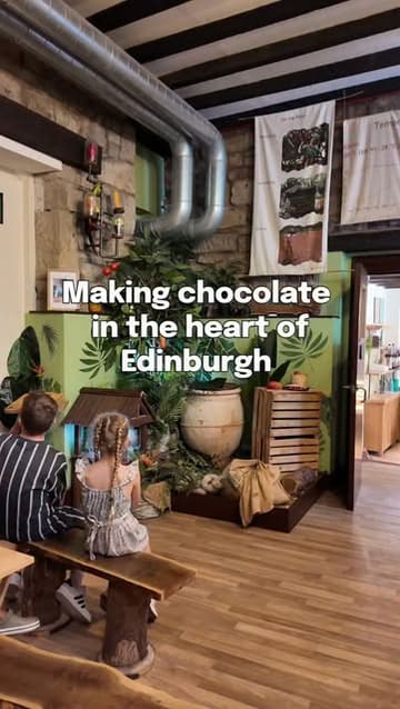 A family visits The Chocolatarium in Edinburgh, participating in a hands-on chocolate-making workshop. The video follows the mother and her two children as they learn about the process, taste warm chocolate, and create their own custom chocolate bars with various toppings.