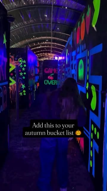 A montage video showcasing a visit to Cammas Hall Farm's pumpkin patch and Halloween event, featuring neon tunnels, scare actors, pumpkin picking, and casual food and drinks.