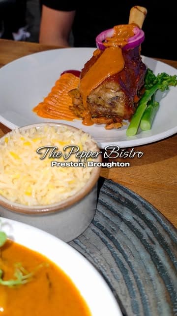 A promotional video showcasing the interior, drinks, and food at The Pepper Bistro in Broughton, Preston, highlighting their elevated Indian cuisine.