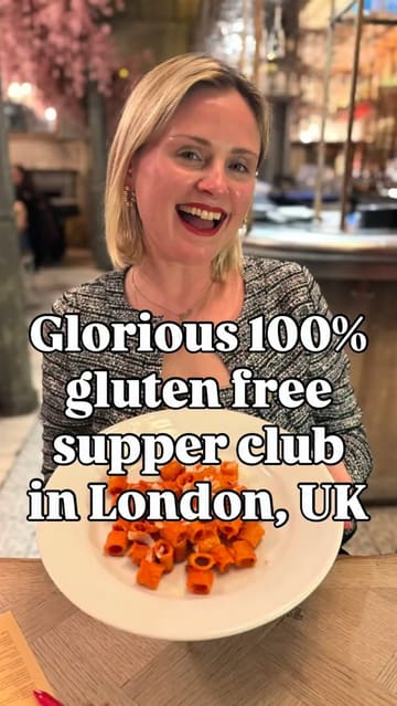 A creator reviews a 100% gluten-free supper club in London, highlighting the atmosphere, the sharing-style menu, and the specific dishes served, including zucchini fries, pasta alla vodka, and pancakes.