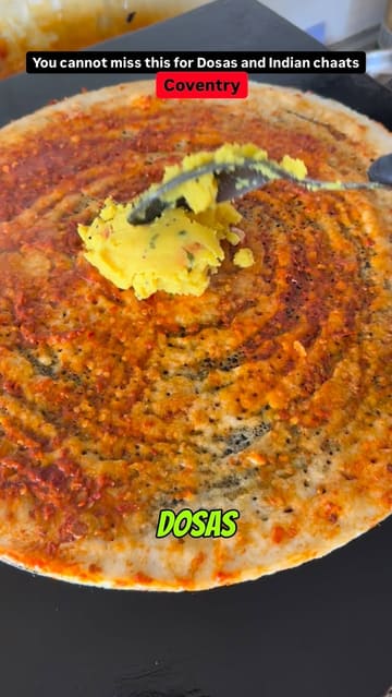A fast-paced food showcase video featuring Indian street food dishes like dosas, pav bhaji, and chaats at a venue called Chaats GPT in Coventry. The video highlights the preparation and final presentation of the food, aiming to entice viewers with the visual appeal of the dishes.