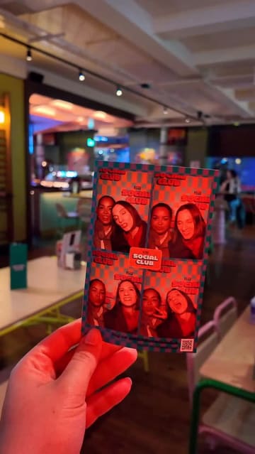 A short, energetic video showcasing a visit to Kerb Social Club, highlighting their unique 'lagerita' cocktail, fried chicken, and sports bar atmosphere. The creator samples the food and drinks while showing off the venue's interior, including a photobooth and sports screens.