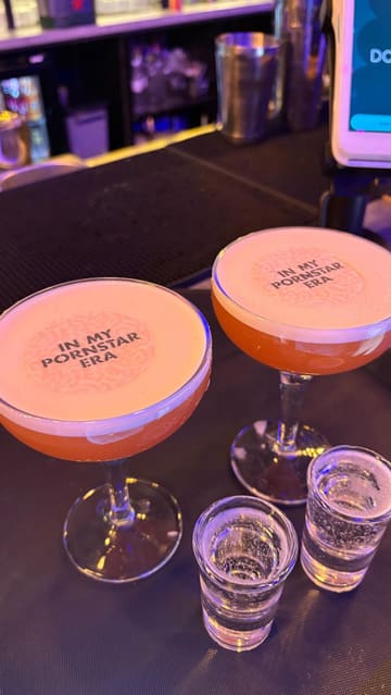 A fast-paced montage showcasing a visit to Boom Battle Bar, featuring augmented darts, arcade basketball, cocktails, and street food. The video captures the energetic atmosphere of the venue, highlighting the combination of competitive socialising and casual dining.