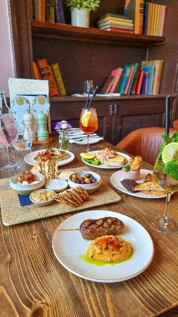 A creator visits The Huntsman in Bath, showcasing their summer drinks menu and a variety of sharing platters and small plates. The video features the interior, the food, and the creator enjoying the experience.