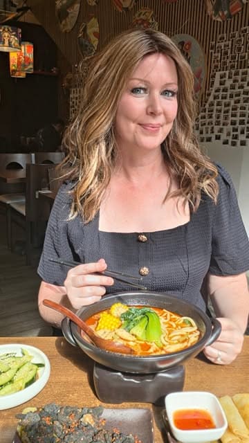 A review of Pot Pot Malatang in Bristol, showcasing the build-your-own soup concept, the interior decor, and various side dishes like charcoal chicken skewers and spring rolls.