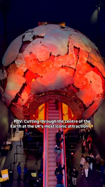 A short, first-person POV video showing the escalator ride through the large, illuminated globe exhibit at the Natural History Museum in London.
