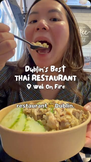 A creator visits Wok On Fire in Dublin to review their Thai street food offerings, specifically highlighting the Hainanese chicken, papaya salad, and boat noodle soup. The video features a mix of talking-head segments and close-ups of the dishes, providing a personal recommendation for the venue.