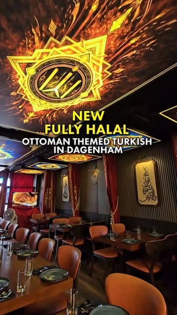 A wide-angle interior shot of a Turkish restaurant in Dagenham, showcasing the Ottoman-themed decor, including ornate ceiling lighting and private dining booths.