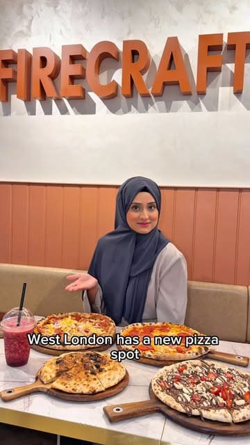 A review of Firecraft Pizza in West London, showcasing the pizza-making process, the interior, and various pizza options including savory and dessert pizzas.