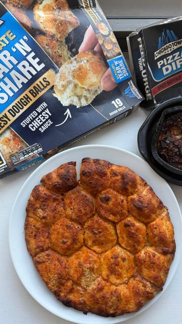 A short video reviewing Chicago Town Tear 'n' Share dough balls paired with a Frank's RedHot pizza dip, showing the preparation and dipping process.