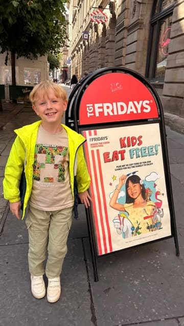 A family-focused vlog showcasing a visit to TGI Fridays, highlighting the 'Kids Eat Free' promotion, the kid-friendly atmosphere, and the staff's interaction with children through balloon animals.