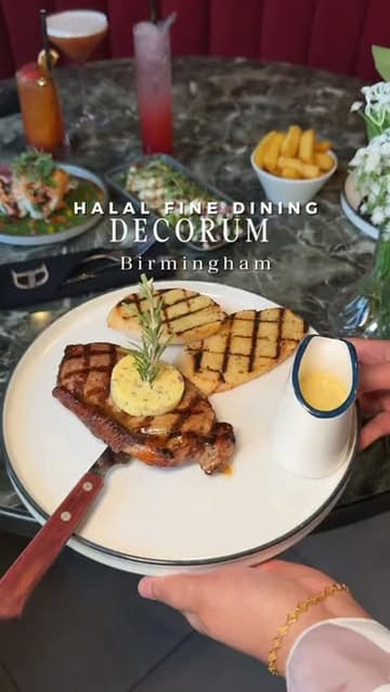 A promotional video for Decorum in Birmingham, showcasing their interior, cocktails, and various dishes including steak, ribs, and bao buns.