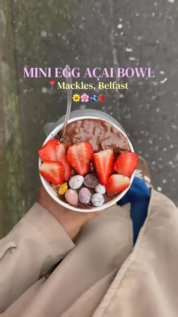 A creator reviews a seasonal Mini Egg and cornflake açai bowl from Mackles in Belfast, sharing her thoughts on the flavour and ingredients while sitting in her car.