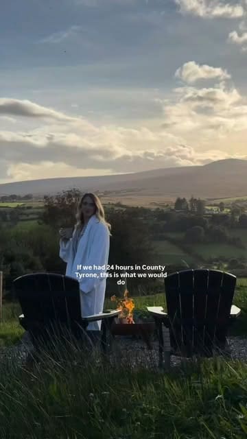 A travel vlog documenting a 24-hour trip to County Tyrone, featuring visits to a therapy garden with saunas, scenic forest walks, local ice cream, a stay in luxury cabins, and coffee shop stops.