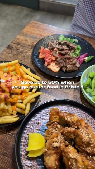 A creator visits Pocha in Bristol to demonstrate the EatClub app, showcasing the restaurant's interior, various Korean dishes like fried chicken and bibimbap, and the ease of using the app for a discount.