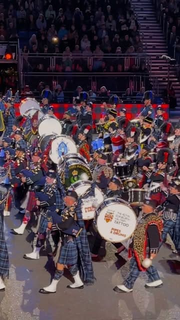 A montage of clips from the Royal Edinburgh Military Tattoo, featuring bagpipe bands, dancers, and fireworks at Edinburgh Castle.