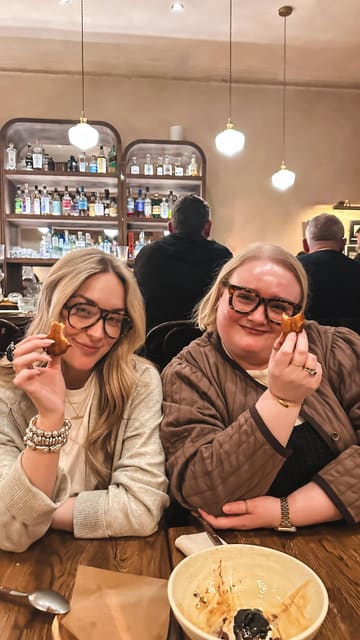 A short, polished montage showcasing a dinner experience at Dogstar in Edinburgh. The video features shots of the exterior, the menu, wine service, and a variety of dishes including bread, small plates, and desserts, concluding with the creators enjoying their meal.