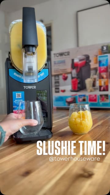 A product demonstration video showing children using a Tower Slushie Fusion machine at home to make mango slushies.