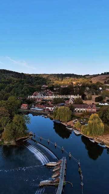 A promotional montage for The Swan at Streatley, featuring drone shots of the riverside location, hotel room interiors, and breakfast dining.