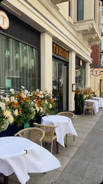 A cinematic montage showcasing the interior and tasting menu experience at Trèsind in Mayfair. The video features slow, deliberate shots of the restaurant's decor, the preparation of elaborate dishes, and the final presentation of various courses, emphasizing the fine dining atmosphere.