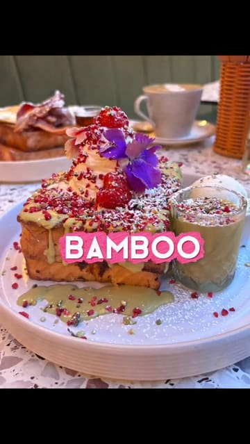 A montage video showcasing various French toast stack options, drinks, and the interior of Bamboo Brunch & Cocktails. The video uses quick, rhythmic cuts to highlight the presentation of the food and the aesthetic of the venue.