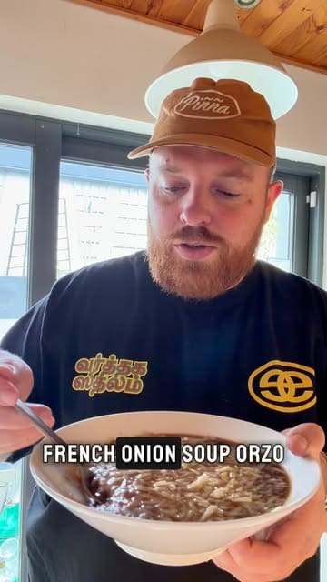 A home cooking tutorial demonstrating how to make French onion soup orzo, featuring step-by-step preparation and cooking of the dish.