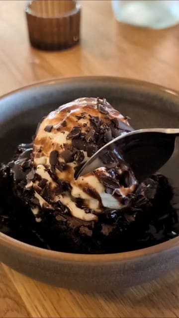 A short, punchy video showcasing a selection of vegan dishes at Shrub in Chester, including artichoke wings, a house burger, Sichuan fries, and a chocolate brownie.