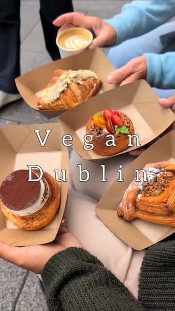 A fast-paced montage video highlighting various vegan-friendly dining spots across Dublin, featuring a diverse range of dishes from pastries and cakes to noodles and tacos.