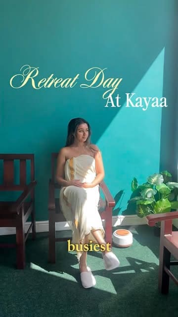 A day-in-the-life style video documenting a visit to Kayaa Holistic Centre for an Ayurvedic retreat, featuring a consultation, various treatments, a South Indian lunch, and yoga.