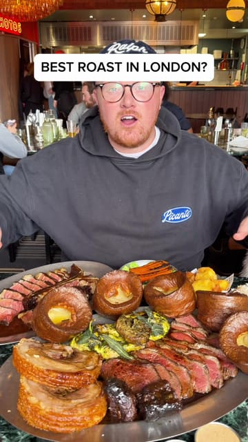The video features a food reviewer visiting a London restaurant to try their Sunday roast and other menu items. The content is fast-paced, focusing on close-up shots of the food being prepared and eaten, including a sharing roast platter, lobster and wagyu lasagna, and a chocolate cake. The creator provides commentary throughout, highlighting the quality of the ingredients and the skill of the chefs.