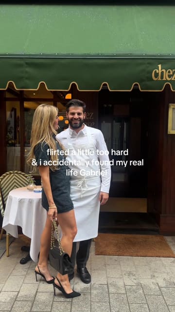 A short, cinematic promotional video for Chez Rose in Mayfair, featuring a romantic, Parisian-bistro aesthetic. The video focuses on the atmosphere and a specific dessert presentation, leaning into a 'date night' narrative.