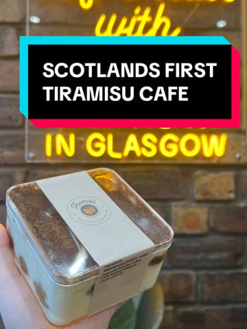 A creator visits Scotland's first dedicated Tiramisu cafe, showcasing the various sizes available and providing a taste test review of the dessert, noting the absence of alcohol.