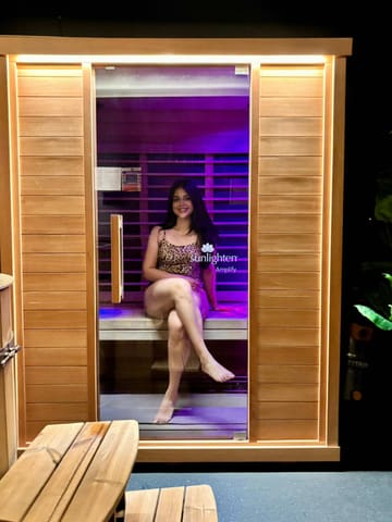 A vlog-style video showcasing a private wellness suite experience in Glasgow, featuring an infrared sauna and ice baths. The creators demonstrate the private room setup, the ease of use, and the relaxing nature of the contrast therapy session.