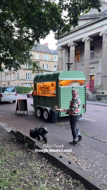 A vlog-style review of a pizza truck called Dough Man's Land, located near Kelvingrove Park in Glasgow. The video highlights the affordability and quality of the wood-fired pizzas, showing the preparation process and the creator enjoying the food.