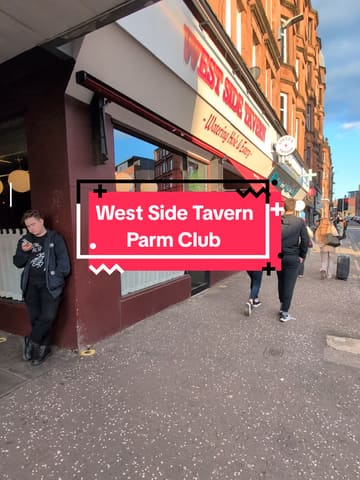 A short, punchy review of the 'Parm Club' at West Side Tavern, highlighting the £12 deal for chicken or meatball parm with sides. The video uses a vlog-style approach with quick cuts to showcase the food and the cozy, dimly lit atmosphere of the venue.
