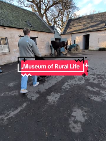 A first-person vlog showcasing a visit to the Museum of Rural Life in East Kilbride, highlighting the farm animals, museum exhibits, and playground facilities suitable for toddlers.