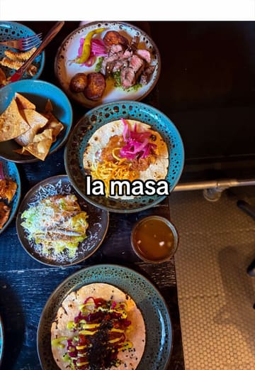 A review-style reel where the creator visits La Masa in Glasgow, showcasing various Mexican dishes including tacos, tostadas, and churros, while maintaining a humorous narrative about trying to join a local food blogging group.