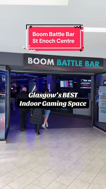 A promotional video showcasing a visit to Boom Battle Bar in Glasgow, highlighting the various competitive socialising games available such as shuffleboard, axe throwing, and augmented reality darts, alongside the food and drink offerings.