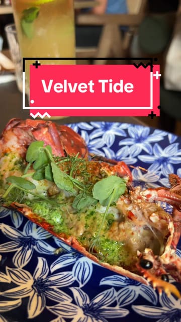 A review-style reel showcasing the food and atmosphere of the newly opened Velvet Tide in Broughty Ferry, Dundee. The video highlights a variety of dishes including Scottish lobster, hake, and crab crumpets, alongside cocktails and desserts, set within a cozy, Scottish mythology-themed interior.