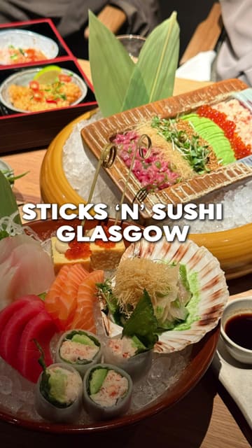 A review of the new Sticks'n'Sushi location in Glasgow, highlighting the quality of the sushi, the interactive 'sushi taco' dish, and the bar area.