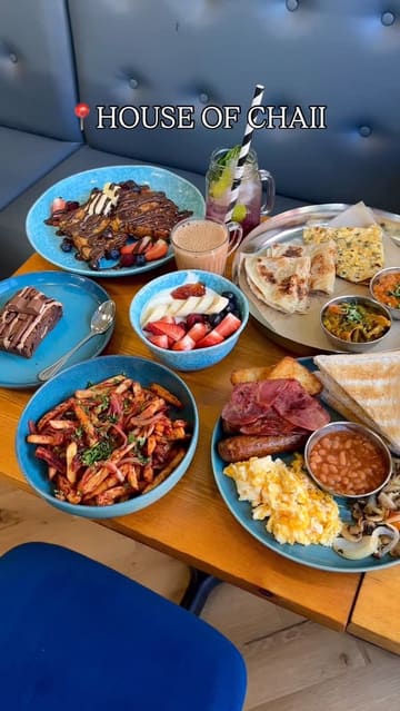 A showcase of a new breakfast spot in Erdington, featuring a variety of dishes including a Desi breakfast, English breakfast, French toast, masala fries, and various drinks.