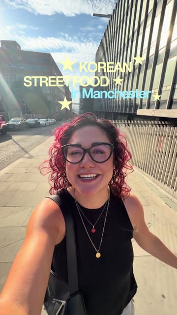 A vibrant, creator-led vlog showcasing the relaunch of Bunsik, a Korean street food venue in Manchester, highlighting the ordering process, a variety of popular dishes like corn dogs and tteokbokki, and the energetic K-pop atmosphere.