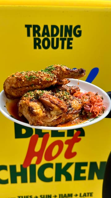 A fast-paced, engaging review of Trading Route in Manchester, highlighting their rotisserie chicken, sides, and new menu items. The video features the creator trying the food, showing the venue's interior, and providing a personal recommendation.