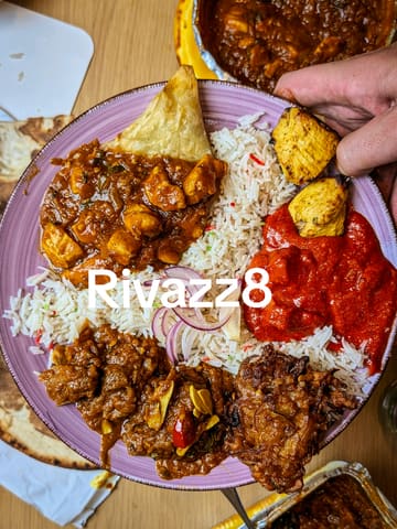 A first-person takeaway review of Rivazz8 in Astley, featuring an unboxing and taste test of various Indian dishes including Afghani chicken, garlic bhuna, and tikka masala.