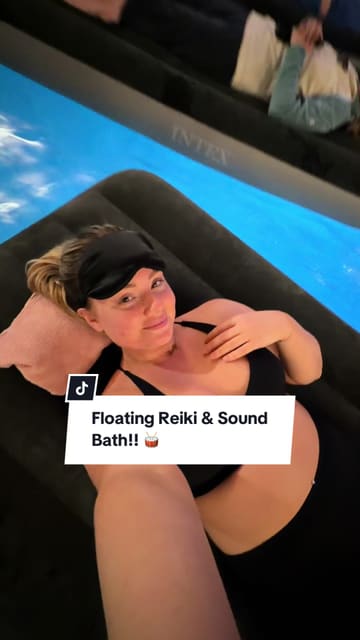 A vlog-style video featuring a creator and her parents participating in a floating reiki and sound bath session at a hotel spa. The video explains the experience, shows the atmosphere, and highlights the relaxing nature of the activity.